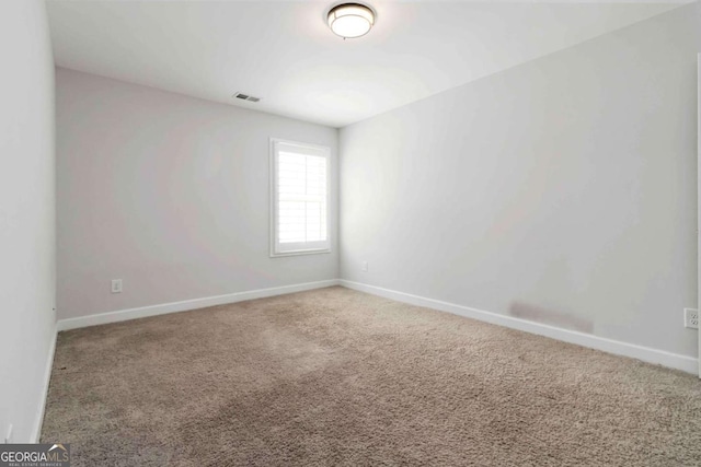 1227 Herty Dr, Marietta, GA 30062 - spare room with carpet floors and baseboards