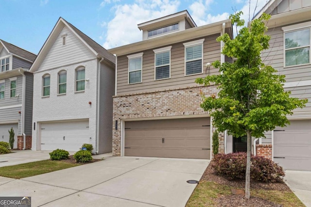 1227 Herty Dr, Marietta, GA 30062 - multi unit property with brick siding, an attached garage, and concrete driveway
