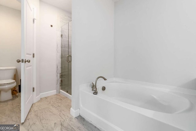 1227 Herty Dr, Marietta, GA 30062 - full bath featuring toilet, a garden tub, a shower stall, marble look tiles, and baseboards
