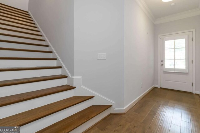 1227 Herty Dr, Marietta, GA 30062 - staircase featuring crown molding, baseboards, and wood finished floors