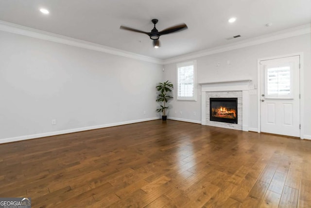 1227 Herty Dr, Marietta, GA 30062 - unfurnished living room with a ceiling fan, hardwood / wood-style flooring, a fireplace, crown molding, and baseboards