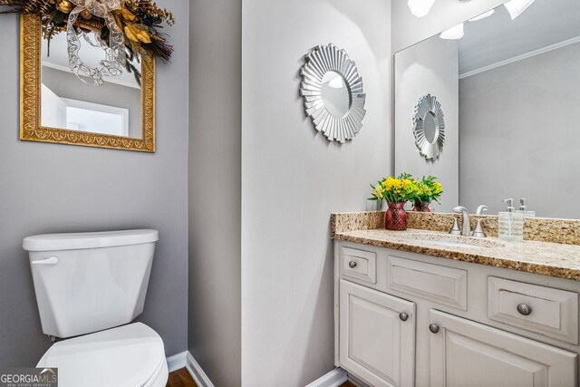 4506 Westcliff Trce NE, Roswell, GA 30075 - half bathroom featuring vanity and crown molding