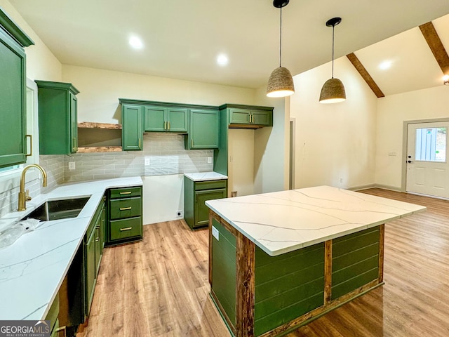169 View St, Clarkesville, GA 30523 - kitchen featuring green cabinets, light wood finished floors, backsplash, and light stone counters