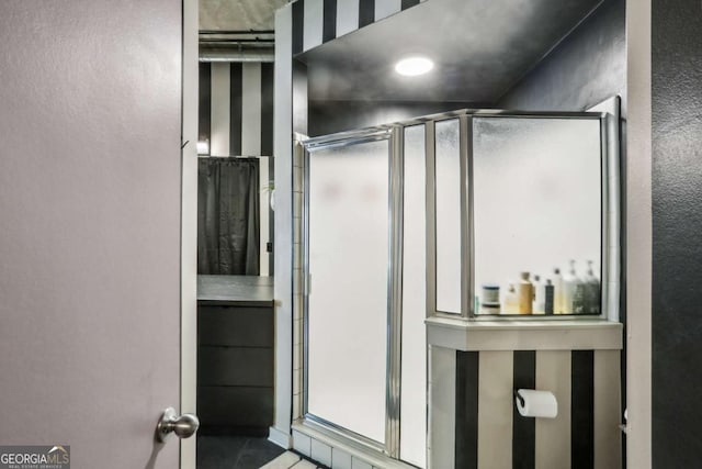 800 Peachtree St NE Unit 1014, Atlanta, GA 30308 - bathroom with a stall shower and tile patterned floors