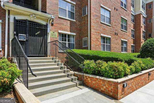800 Peachtree St NE Unit 1014, Atlanta, GA 30308 - view of exterior entry featuring brick siding