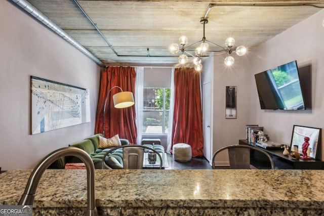 800 Peachtree St NE Unit 1014, Atlanta, GA 30308 - kitchen featuring a chandelier