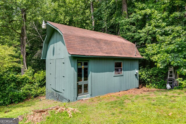 2575 Dobbs Dr NW, Kennesaw, GA 30152 - view of outbuilding featuring a forest view