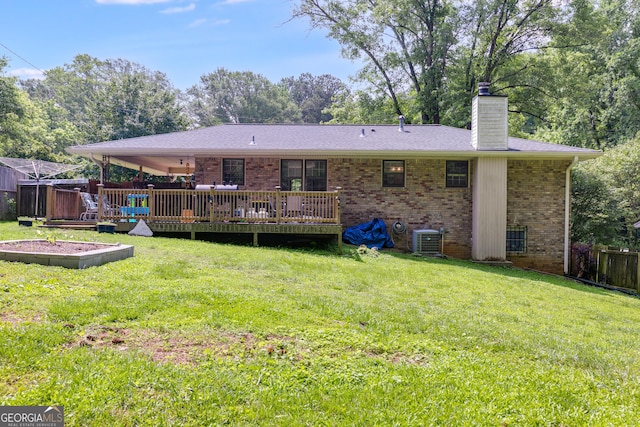 2575 Dobbs Dr NW, Kennesaw, GA 30152 - rear view of property with brick siding, central AC unit, a chimney, and a wooden deck