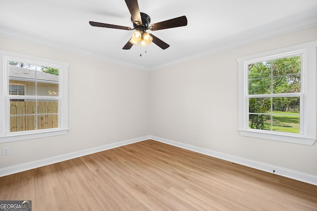 1905 Azalea, Valdosta, GA 31602 - unfurnished room with light wood-type flooring, baseboards, a ceiling fan, and crown molding