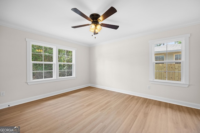 1905 Azalea, Valdosta, GA 31602 - unfurnished room featuring light wood-style flooring, ornamental molding, baseboards, and a ceiling fan