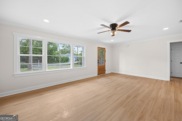 1905 Azalea, Valdosta, GA 31602 - unfurnished living room with crown molding, baseboards, a ceiling fan, light wood-type flooring, and recessed lighting