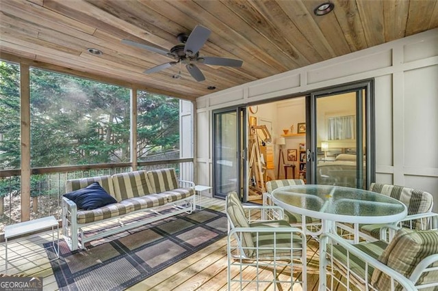 6550 Bluewaters Dr, Flowery Branch, GA 30542 - sunroom / solarium with a ceiling fan, an outdoor hangout area, and outdoor dining area