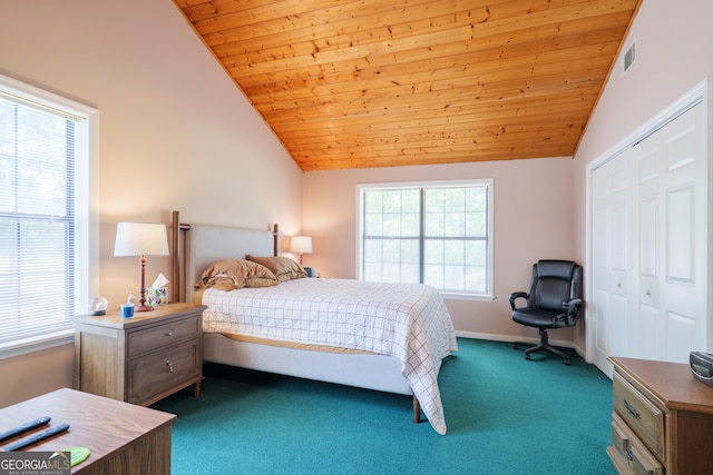 3382 Antioch Greggs Rd, Adel, GA 31620 - bedroom with lofted ceiling, dark colored carpet, a closet, baseboards, and wooden ceiling