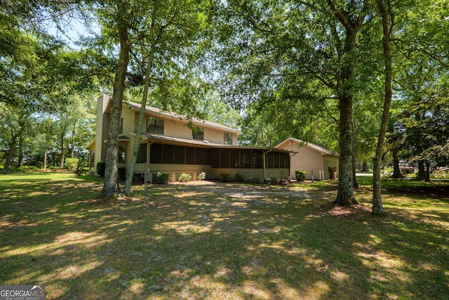 3382 Antioch Greggs Rd, Adel, GA 31620 - view of green lawn with a sunroom