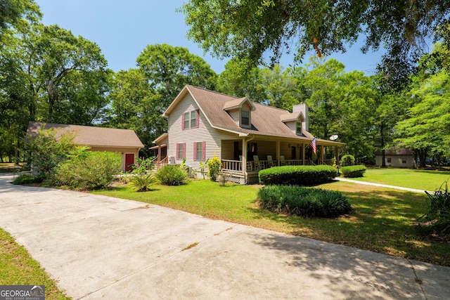 3382 Antioch Greggs Rd, Adel, GA 31620 - new england style home featuring a porch, a front yard, and a chimney
