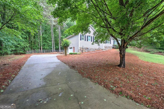 23 Timberlake Pointe NE, Cartersville, GA 30121 - view of side of property featuring driveway and an attached garage