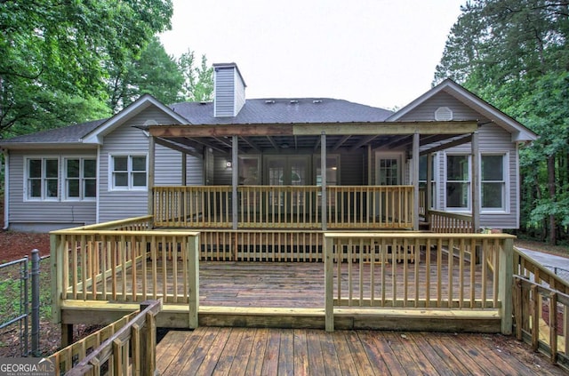 23 Timberlake Pointe NE, Cartersville, GA 30121 - rear view of house with roof with shingles, a wooden deck, and a chimney