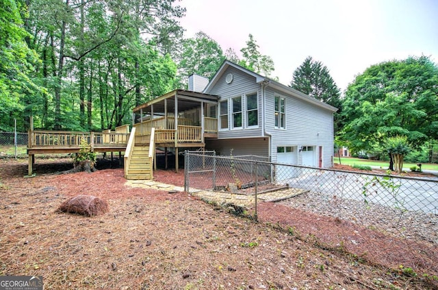23 Timberlake Pointe NE, Cartersville, GA 30121 - rear view of house with stairway, a wooden deck, a garage, a sunroom, and driveway