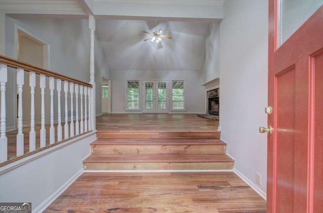 23 Timberlake Pointe NE, Cartersville, GA 30121 - staircase with high vaulted ceiling, wood finished floors, a ceiling fan, and baseboards