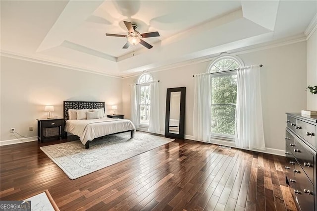 5940 Plantation Dr, Roswell, GA 30075 - bedroom with a tray ceiling, multiple windows, dark wood-style floors, crown molding, and baseboards