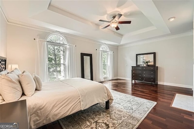 5940 Plantation Dr, Roswell, GA 30075 - bedroom with a raised ceiling, multiple windows, wood finished floors, and baseboards