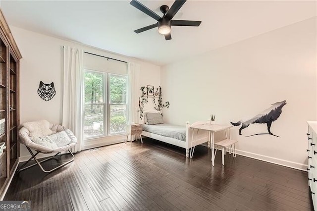 5940 Plantation Dr, Roswell, GA 30075 - sitting room featuring ceiling fan, dark wood finished floors, and baseboards
