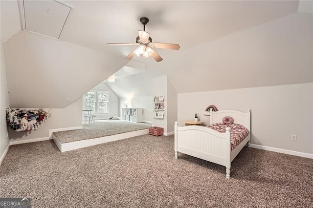 5940 Plantation Dr, Roswell, GA 30075 - carpeted bedroom featuring vaulted ceiling, baseboards, a ceiling fan, and attic access