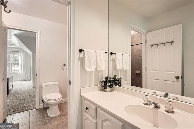 5940 Plantation Dr, Roswell, GA 30075 - full bathroom featuring vanity, toilet, tile patterned flooring, and a shower