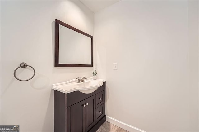 5940 Plantation Dr, Roswell, GA 30075 - bathroom featuring vanity and baseboards