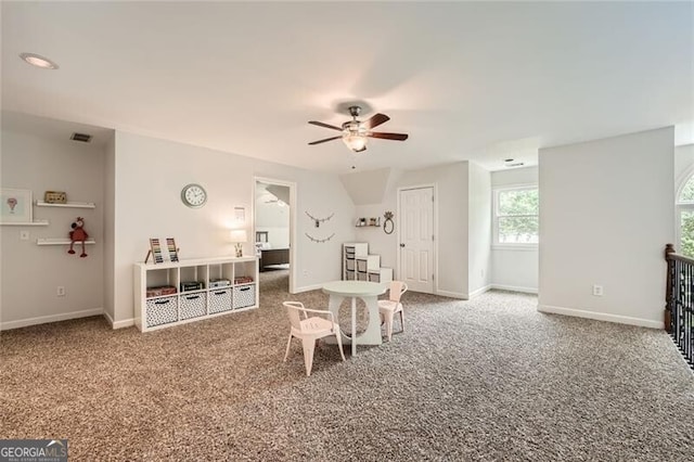 5940 Plantation Dr, Roswell, GA 30075 - carpeted dining room featuring a ceiling fan and baseboards