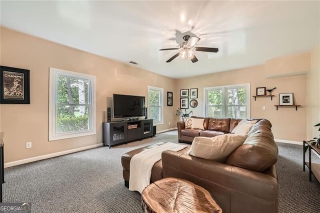 5940 Plantation Dr, Roswell, GA 30075 - carpeted living area featuring a ceiling fan, plenty of natural light, and baseboards