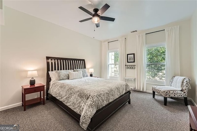 5940 Plantation Dr, Roswell, GA 30075 - bedroom featuring dark colored carpet, baseboards, and a ceiling fan