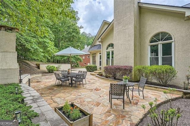 5940 Plantation Dr, Roswell, GA 30075 - view of patio / terrace featuring outdoor dining area