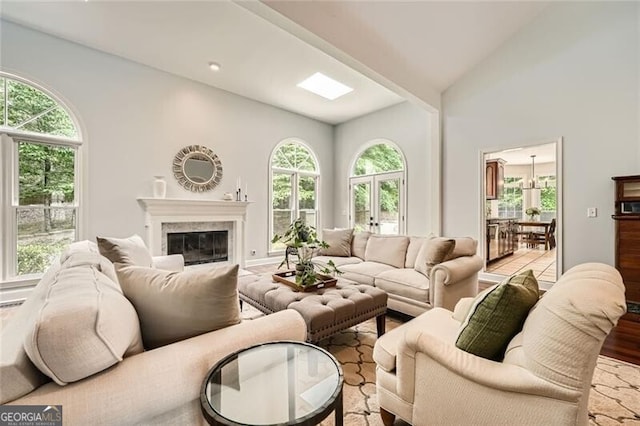 5940 Plantation Dr, Roswell, GA 30075 - living area with lofted ceiling and a premium fireplace