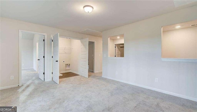 165 Cooper Cv E, Fayetteville, GA 30215 - unfurnished bedroom with carpet floors, baseboards, and a closet