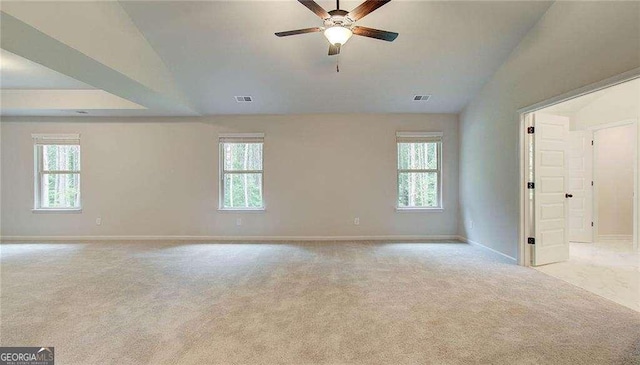 165 Cooper Cv E, Fayetteville, GA 30215 - carpeted empty room with plenty of natural light, ceiling fan, baseboards, and vaulted ceiling