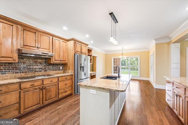 737 Raleigh Cobb Rd, Hawkinsville, GA 31036 - kitchen with stainless steel fridge with ice dispenser, black electric cooktop, under cabinet range hood, a sink, and dark wood-style flooring