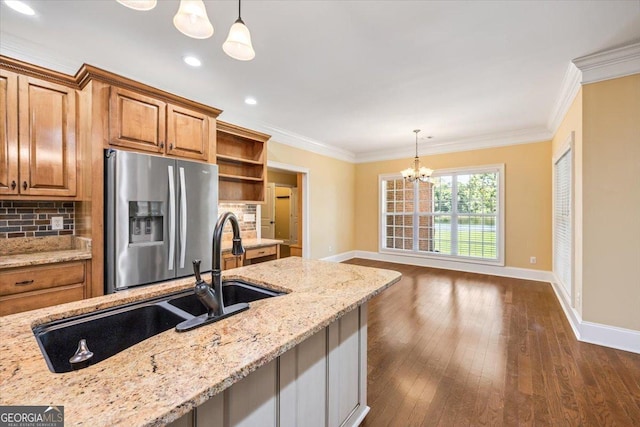 737 Raleigh Cobb Rd, Hawkinsville, GA 31036 - kitchen featuring stainless steel fridge, a chandelier, baseboards, open shelves, and crown molding
