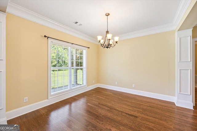 737 Raleigh Cobb Rd, Hawkinsville, GA 31036 - unfurnished room featuring crown molding, a chandelier, dark wood finished floors, and baseboards