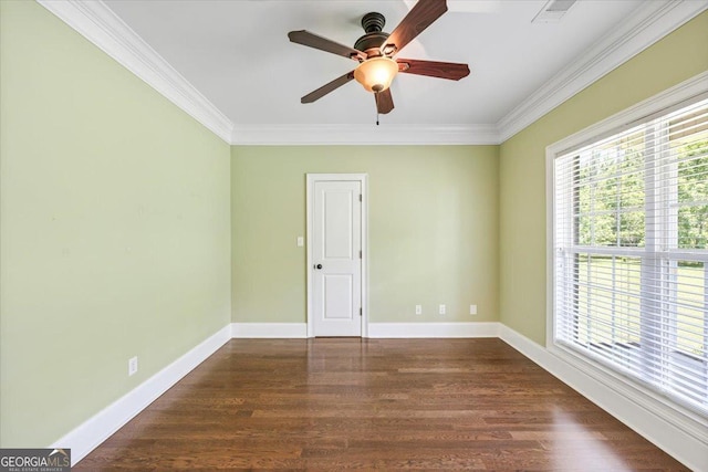 737 Raleigh Cobb Rd, Hawkinsville, GA 31036 - empty room with plenty of natural light, ornamental molding, a ceiling fan, dark wood-style floors, and baseboards