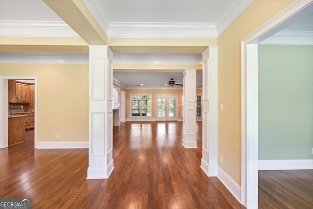 737 Raleigh Cobb Rd, Hawkinsville, GA 31036 - hallway with decorative columns, dark wood-style flooring, crown molding, baseboards, and french doors