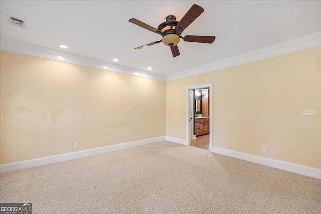 737 Raleigh Cobb Rd, Hawkinsville, GA 31036 - empty room featuring ornamental molding, a ceiling fan, light carpet, baseboards, and recessed lighting