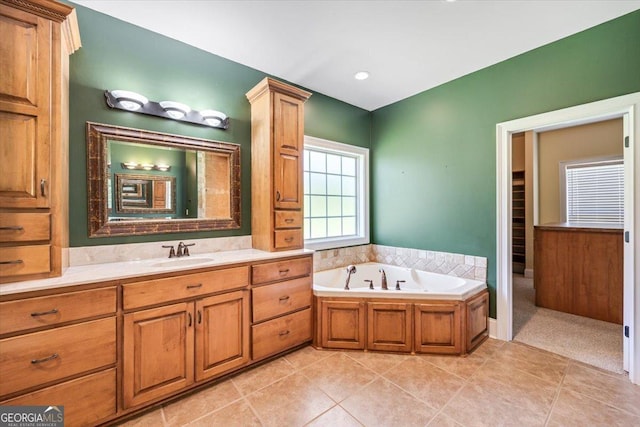 737 Raleigh Cobb Rd, Hawkinsville, GA 31036 - full bath with a garden tub, vanity, and tile patterned floors