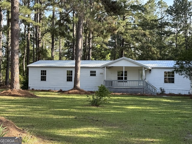 12103 US Highway 80 E, Brooklet, GA 30415 - manufactured / mobile home with a porch, a front lawn, and metal roof