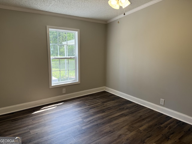 12103 US Highway 80 E, Brooklet, GA 30415 - empty room featuring dark wood-style flooring, a textured ceiling, crown molding, baseboards, and a ceiling fan