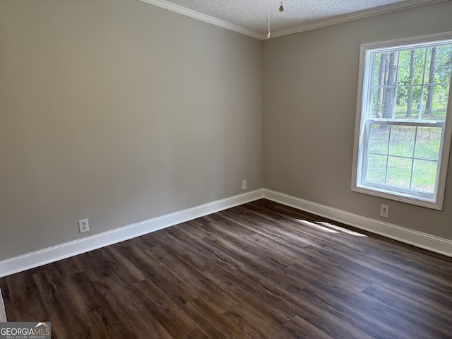 12103 US Highway 80 E, Brooklet, GA 30415 - unfurnished room featuring plenty of natural light, baseboards, dark wood-style floors, a textured ceiling, and crown molding