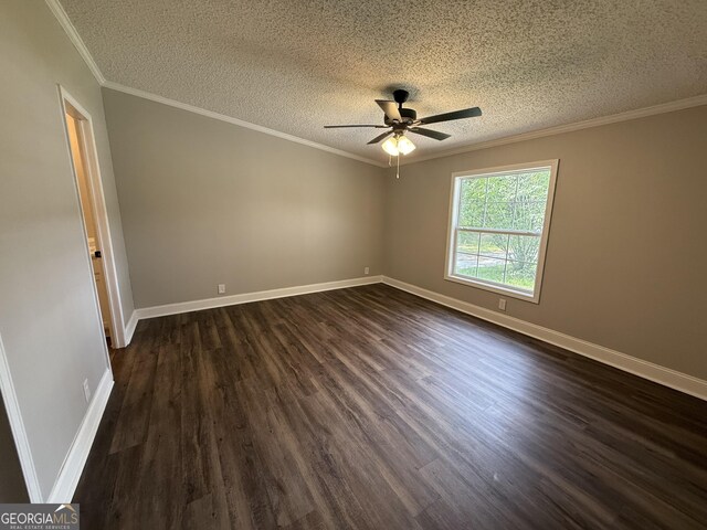 12103 US Highway 80 E, Brooklet, GA 30415 - empty room featuring a textured ceiling, dark wood finished floors, ceiling fan, baseboards, and ornamental molding