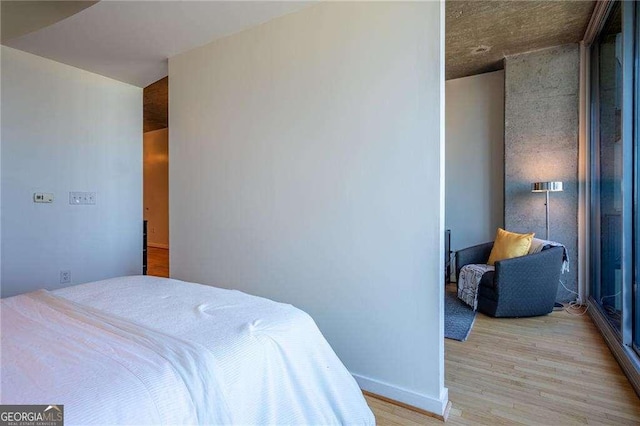 860 Peachtree St NE Unit 1613, Atlanta, GA 30308 - bedroom with light wood-type flooring