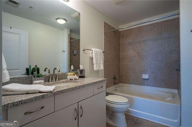 860 Peachtree St NE Unit 1613, Atlanta, GA 30308 - full bathroom featuring tile patterned floors, vanity, and bathtub / shower combination