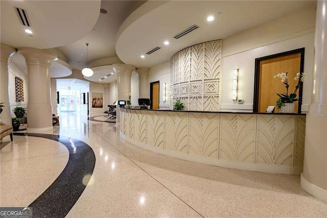 860 Peachtree St NE Unit 1613, Atlanta, GA 30308 - reception area with decorative columns and recessed lighting
